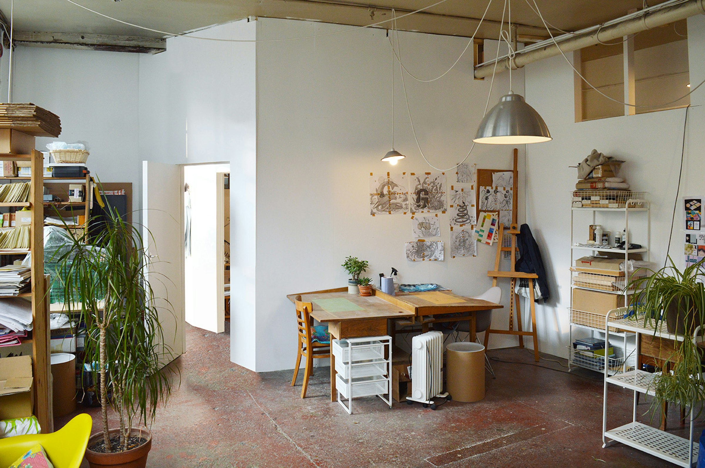 A desk in a creative art studio in hackney that is available to rent