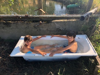 Bathtub for filling with cold spring water.