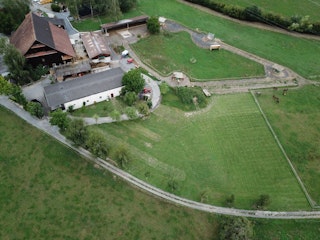 Our farm from above. Campin place on the right below.