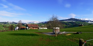 The pitch with a wide panoramic view of the Alpstein.