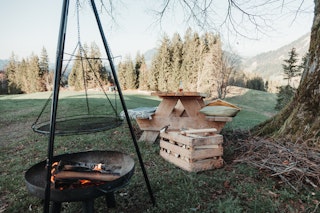 Fire bowl, table and firewood