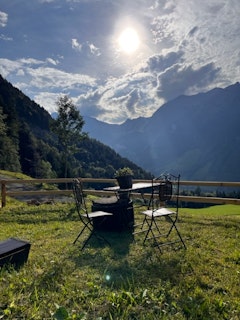 Sitting area with fireplace/grill, view of Storeggpass, Lutersee & Widderfeldsock.